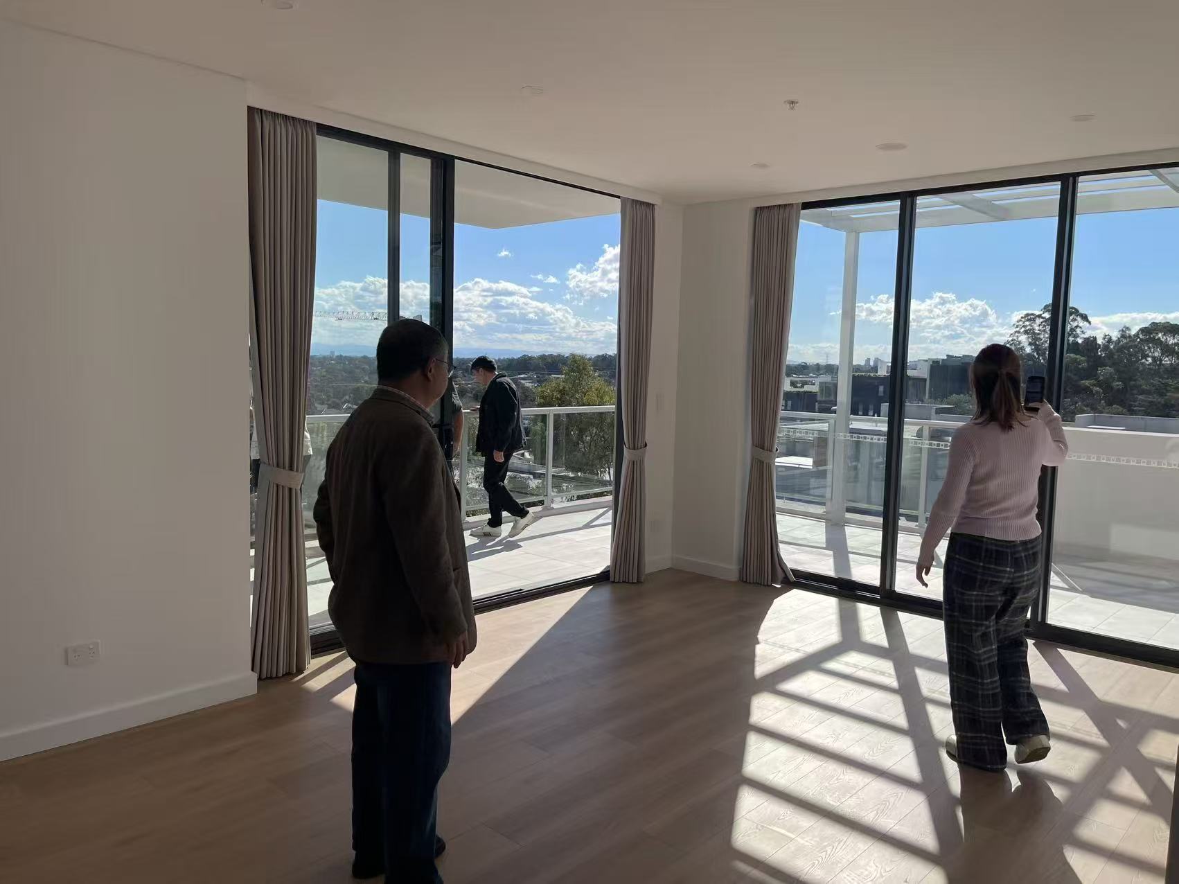 Sunlit 88 Livie living area opening to a generous balcony