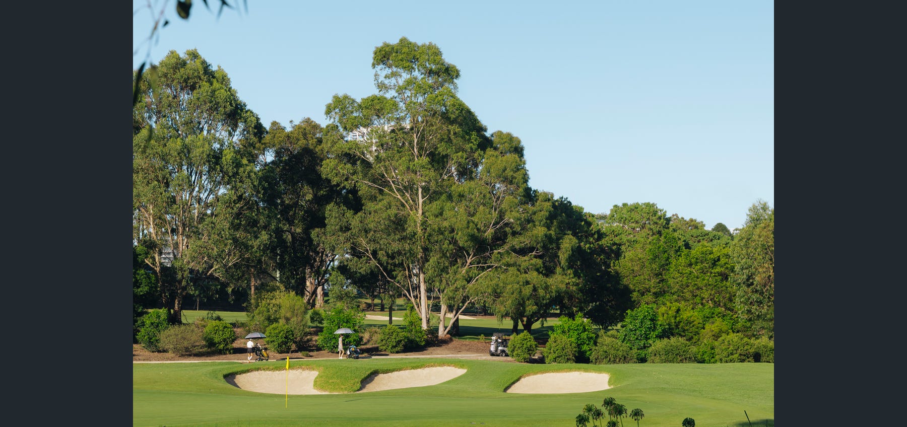 Nearby golf course and landscaped green outlook