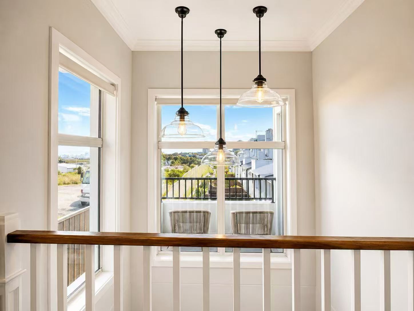 Light-filled upper landing with district outlook